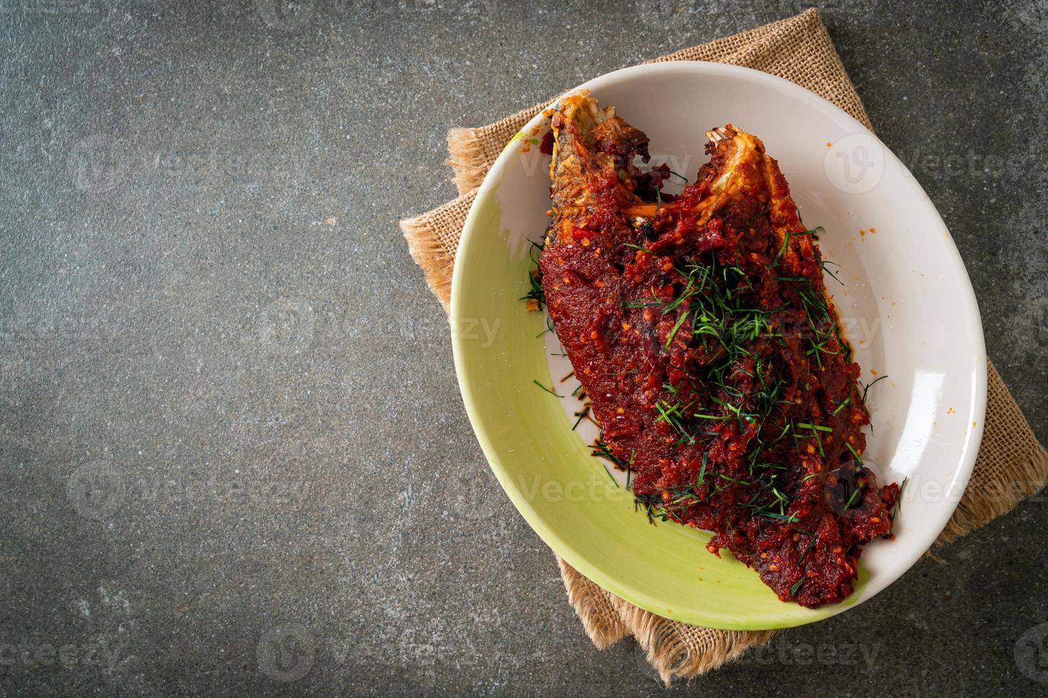 Deep fried fish and chili sauce photo