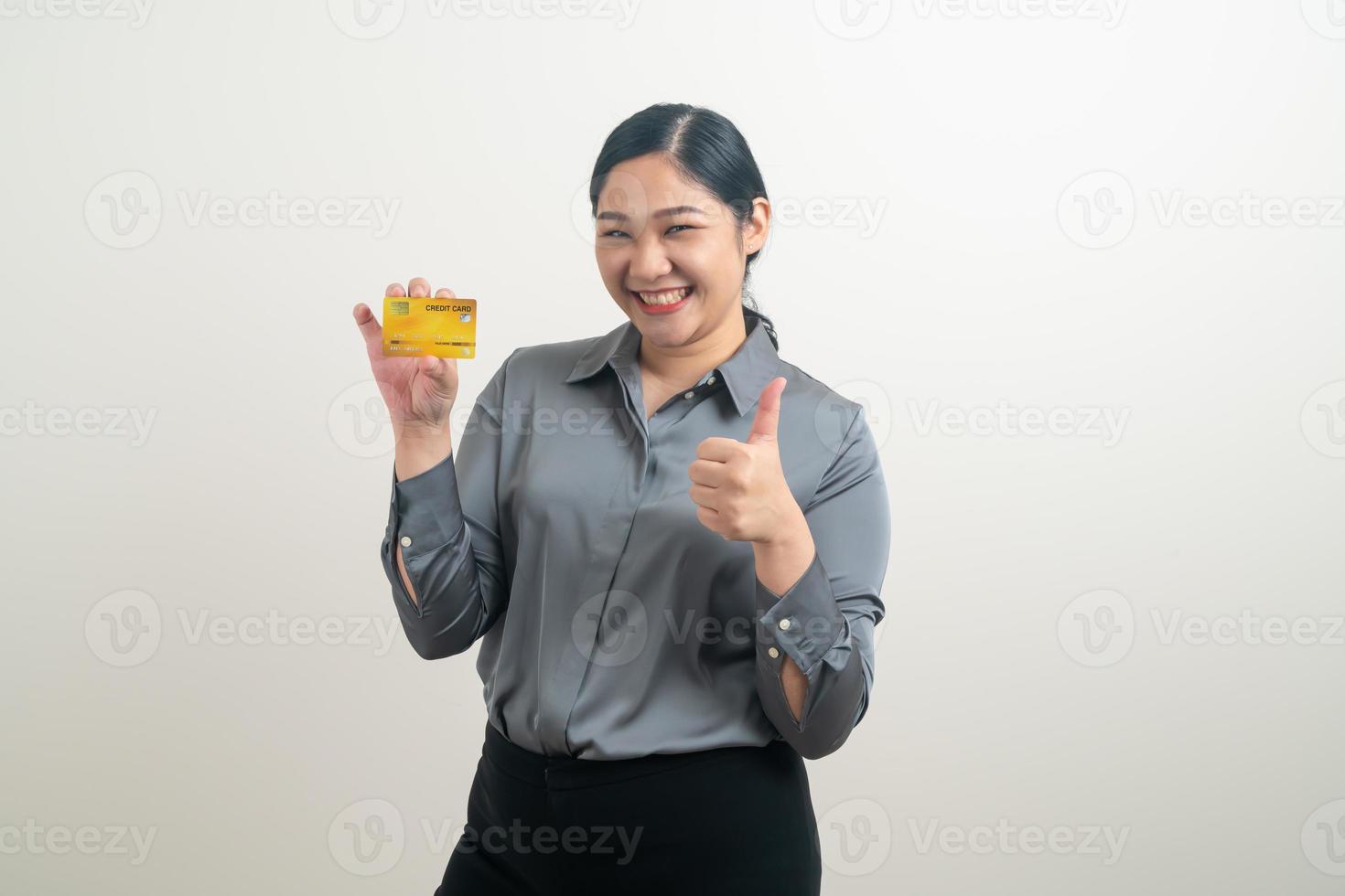 Asian woman holding credit card with white background photo