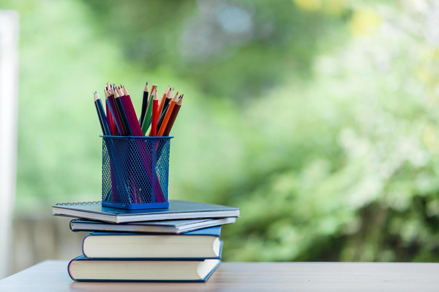 Notebooks and pencils photo