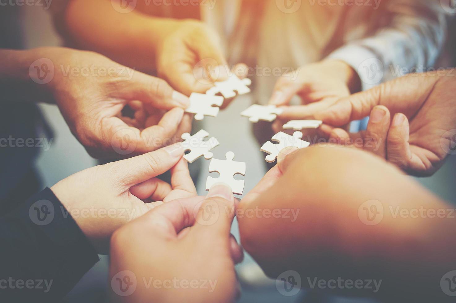 Everyone is an important jigsaw at work. photo