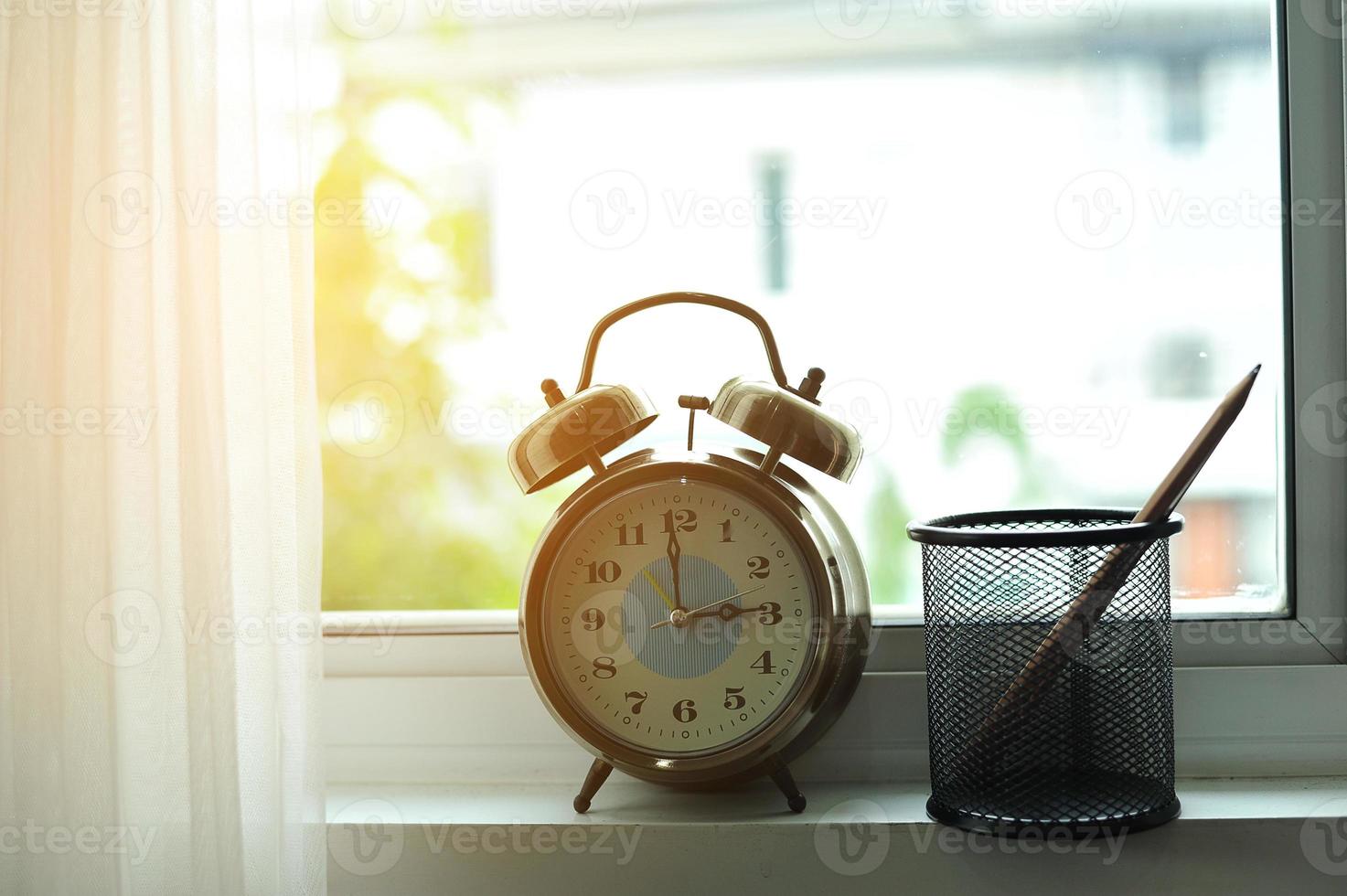 Alarm clock in the morning 6612352 Stock Photo at Vecteezy