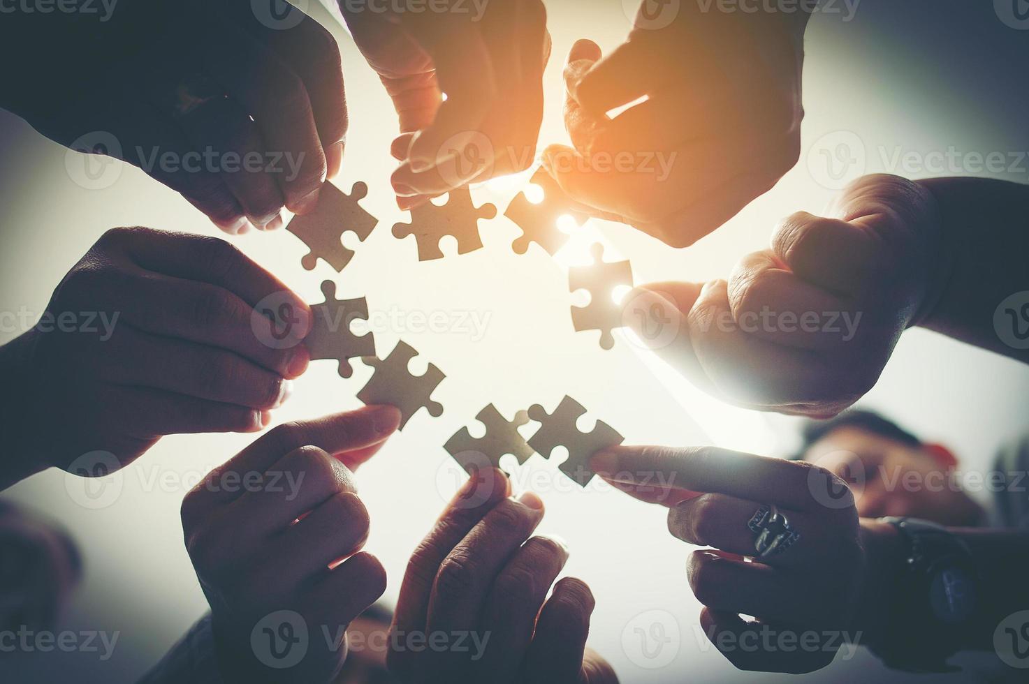 Everyone is an important jigsaw at work. photo