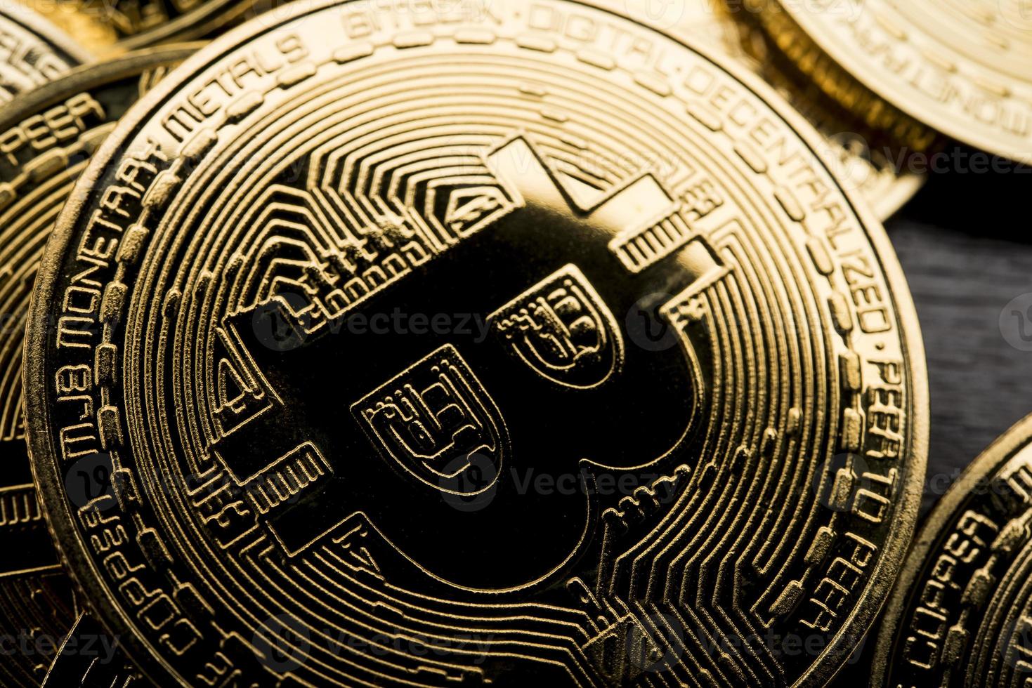 Bitcoin coin the physical bit Digital currency cryptocurrency A gold coin with a gorgeous golden bitcoin symbol. Fit your valuable work. photo