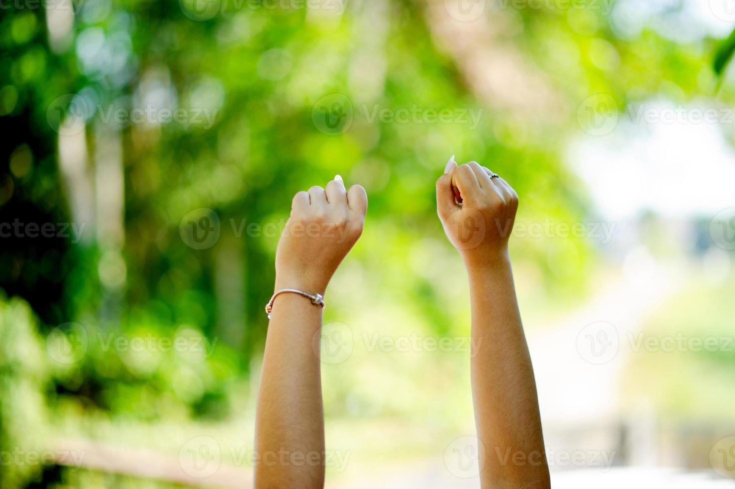 The clenched fist expresses strength. and being a fighter self encouragement self expression A true expression of victory empty-handed victory photo