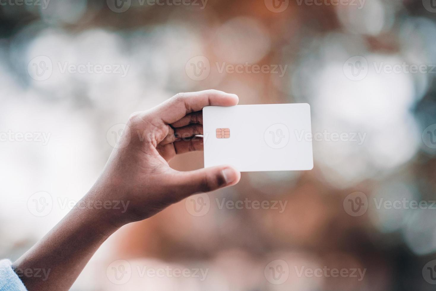 Hands and credit cards of business people. photo