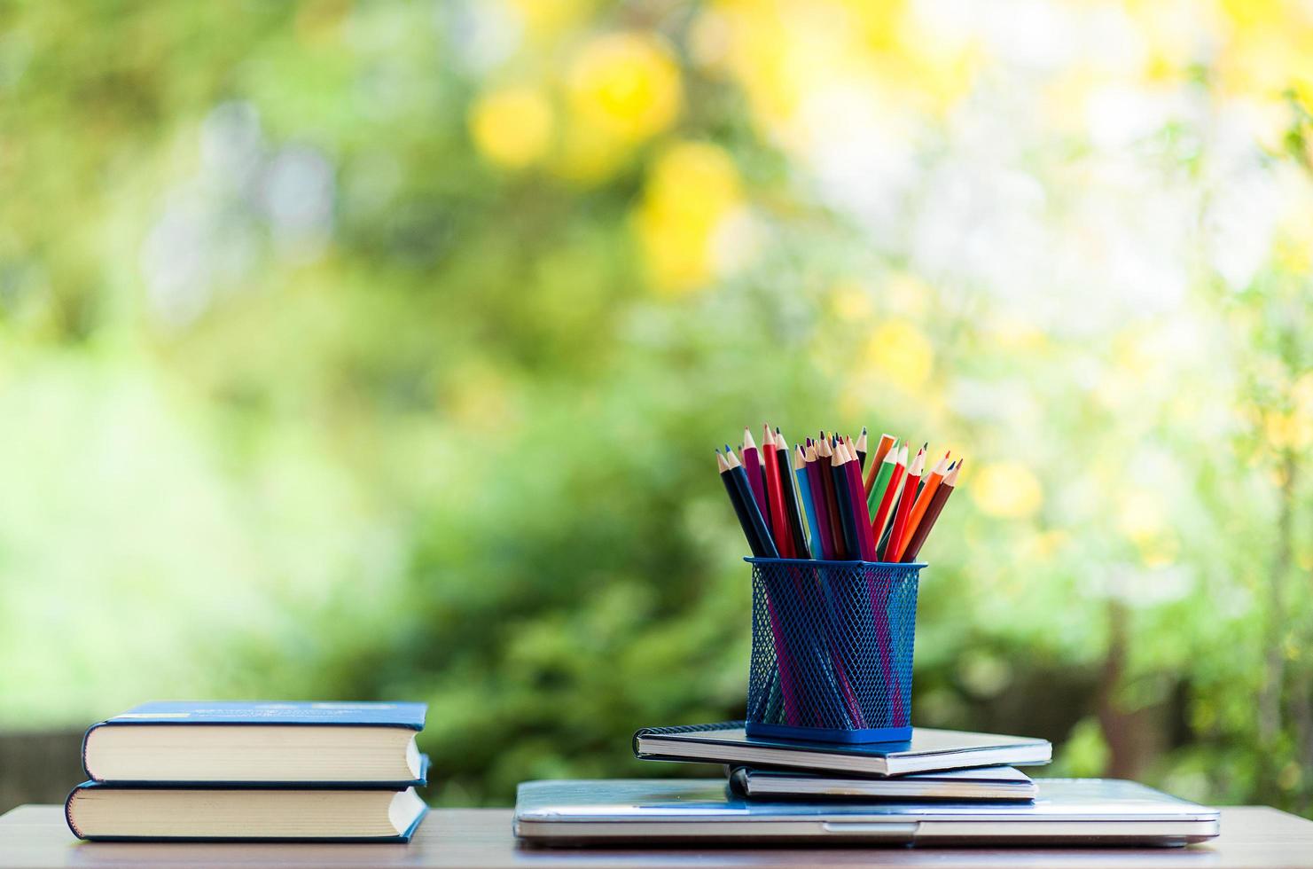 Notebooks and pencils photo