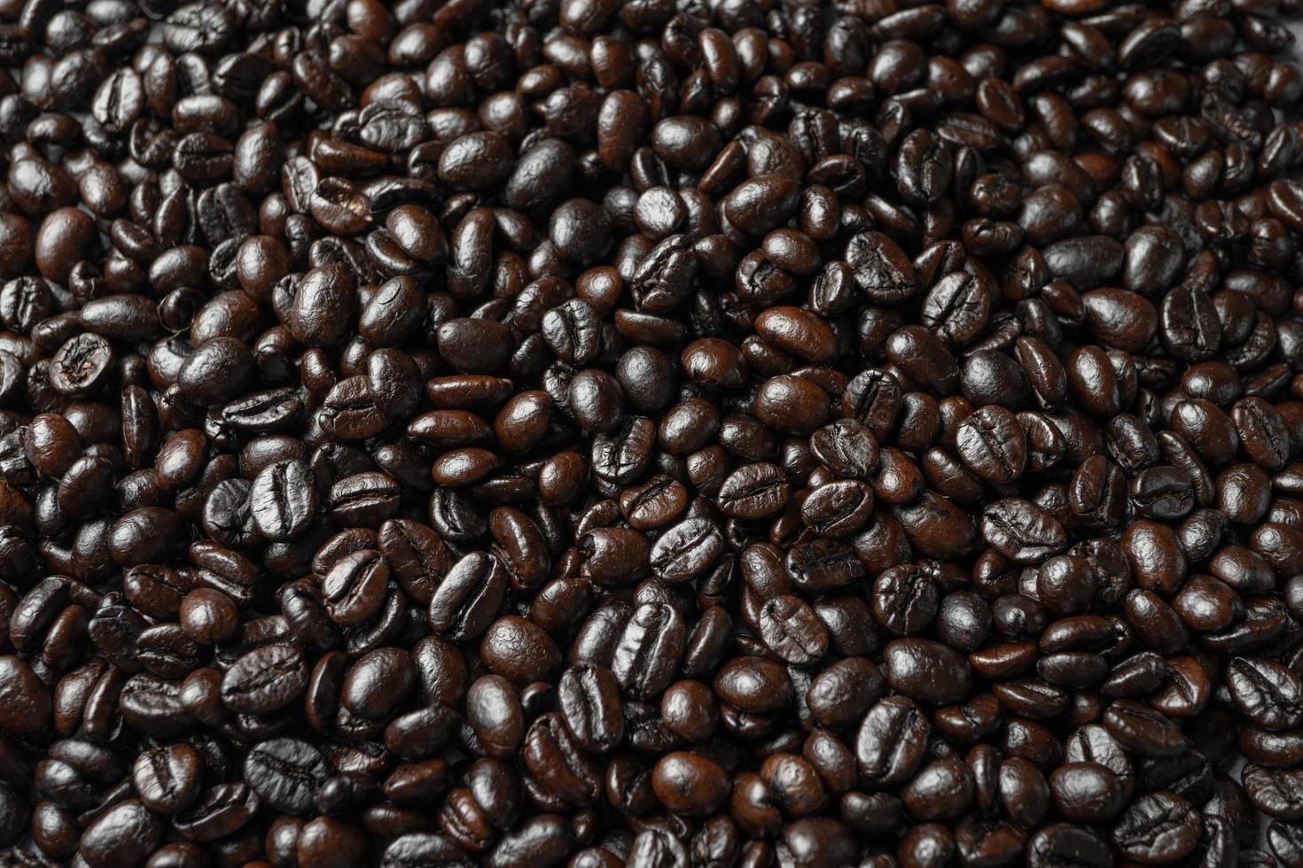 semilla de granos de café frescos, fondo de textura, fondo de pantalla completo. foto