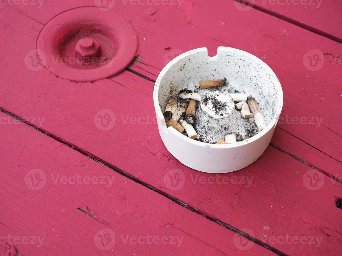 ash filled ashtray photo