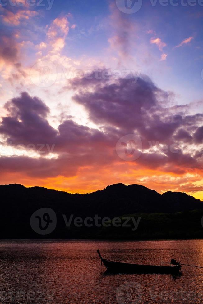 landscape of sunset , sky in Twilight time with Small Fishing Boats in Thailand photo