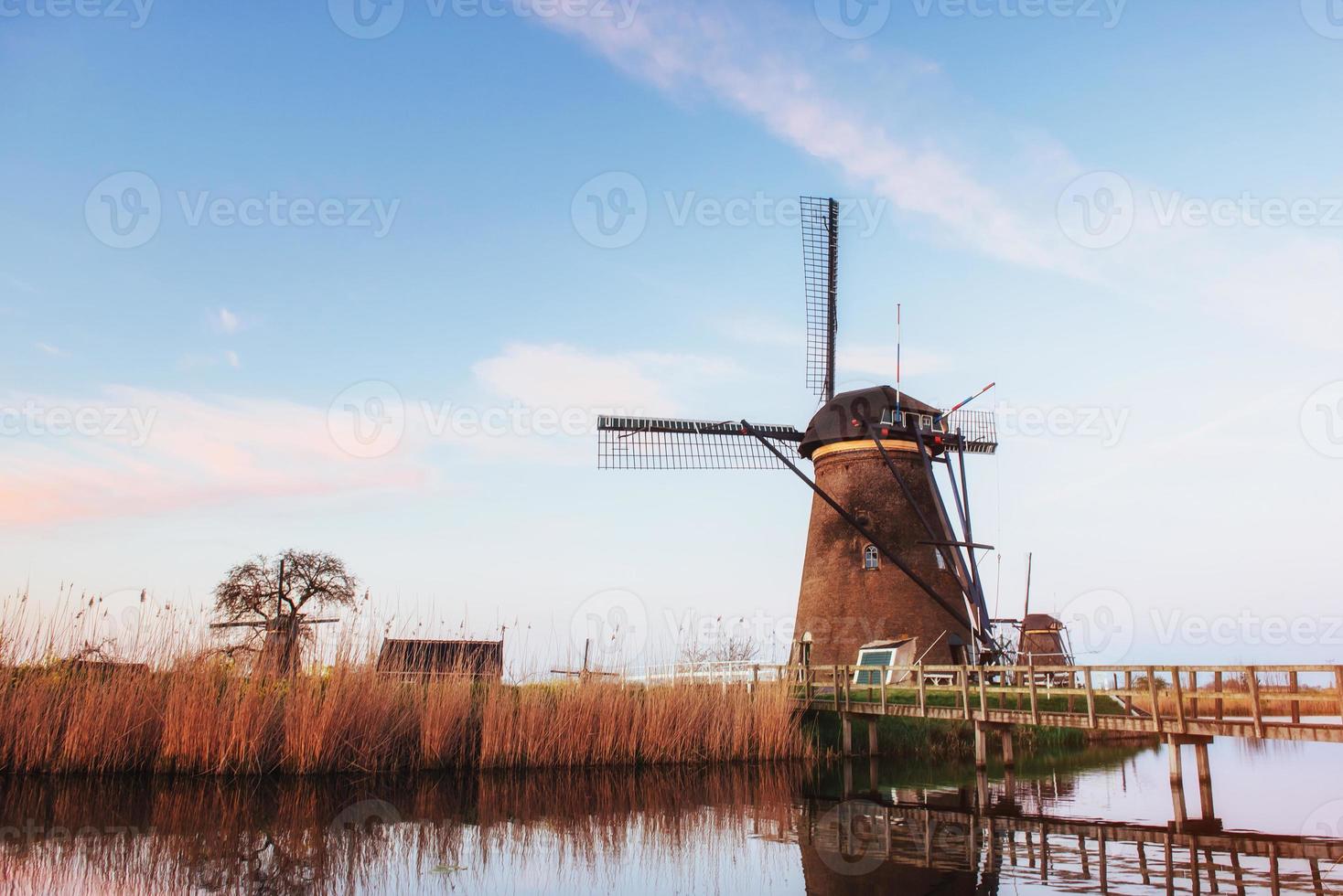 Traditional Dutch windmills from the channel Rotterdam. Holland photo