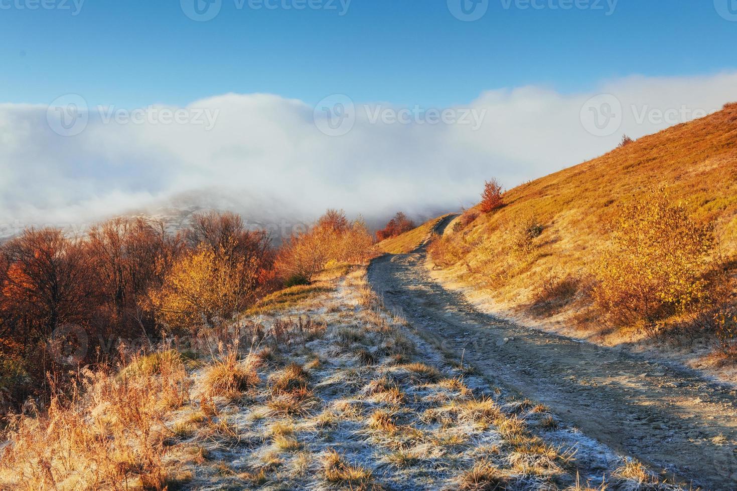 October mountain range in the first winter days photo