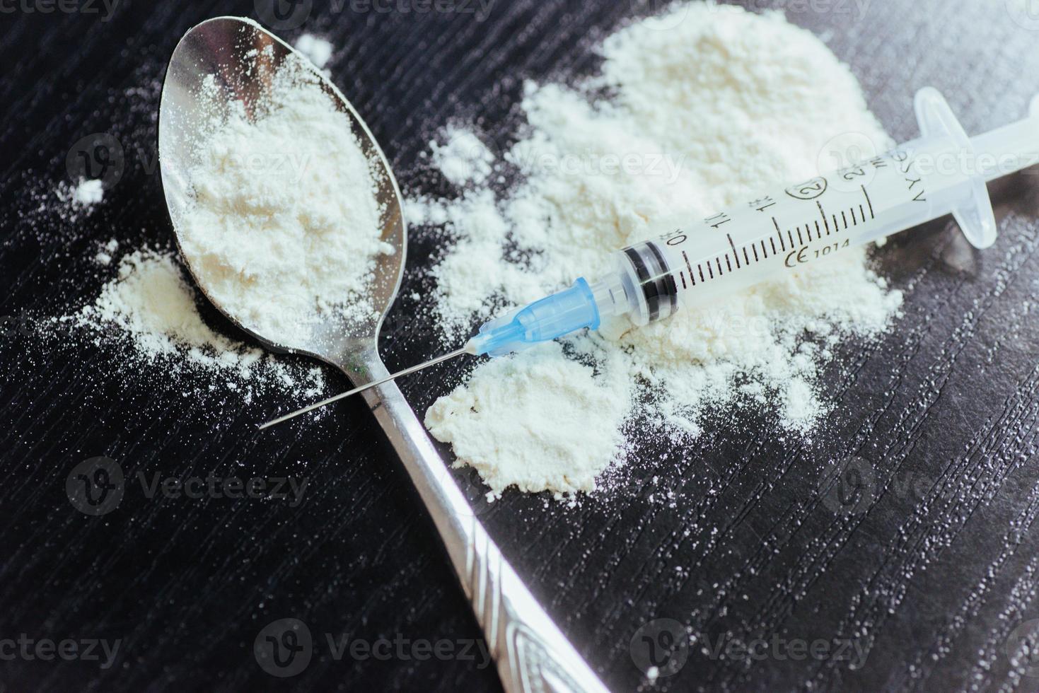 drug use, addiction and substance abuse concept - close up of sp photo