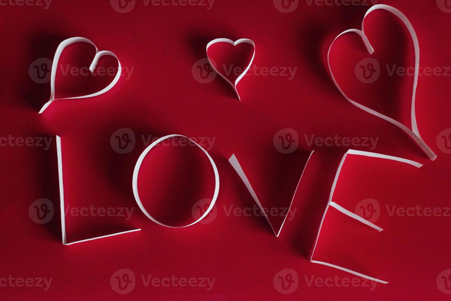 Valentine's day abstract background with cut paper heart photo