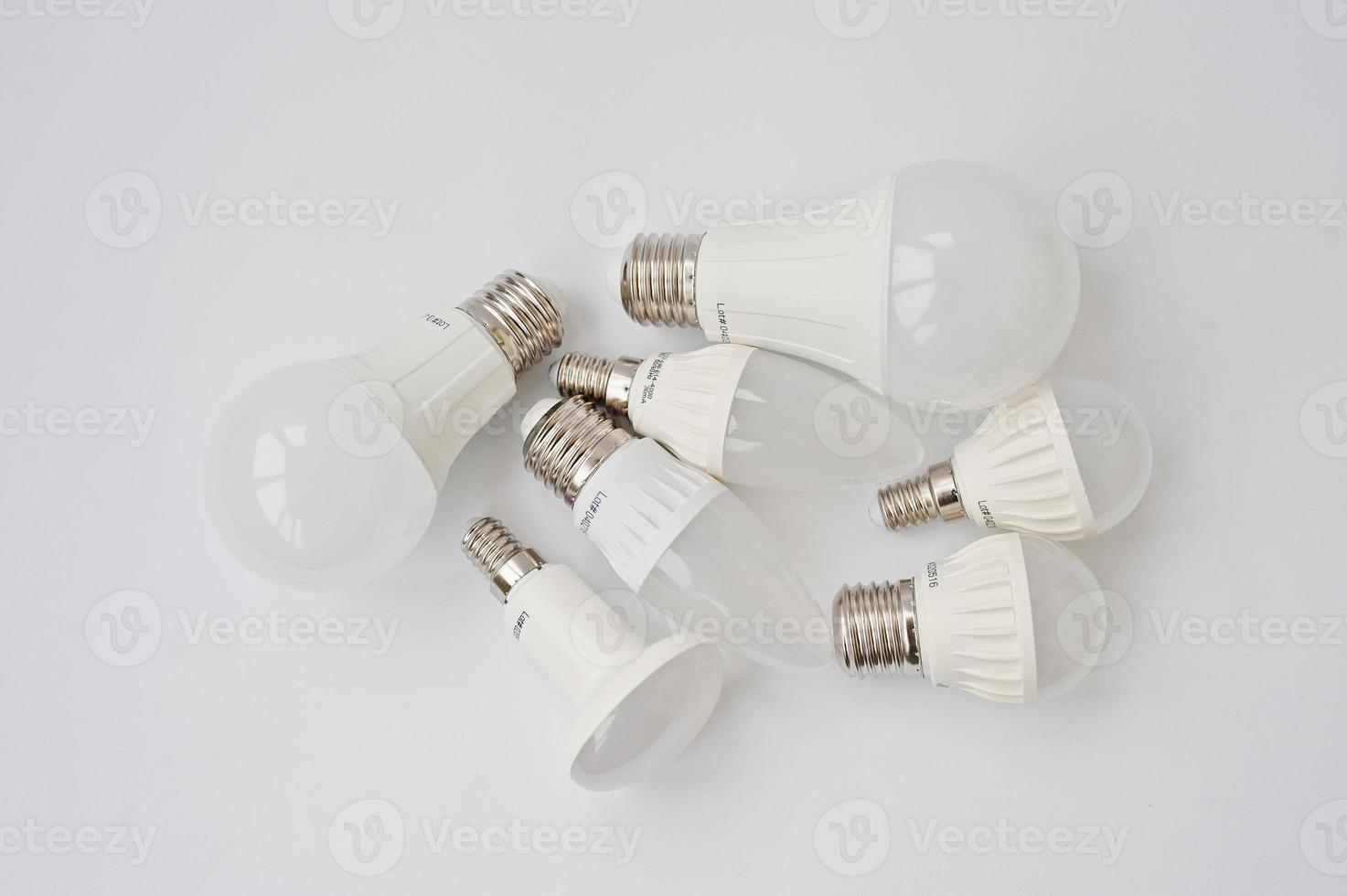 Set of row LED bulbs isolated on white background. photo