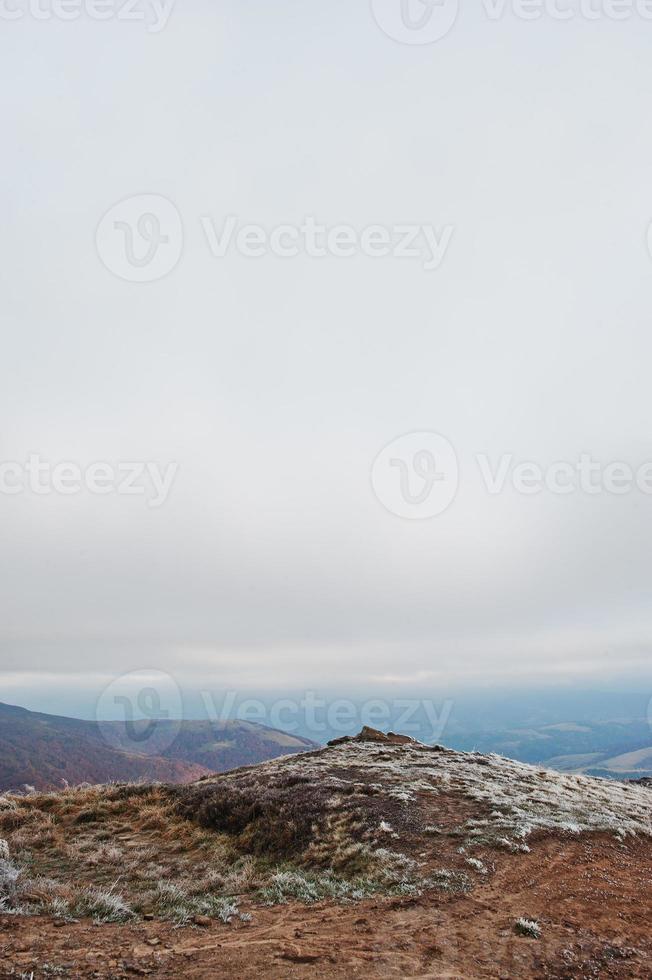Top of frost mountain hill at Carpathian mountains. Vertical photo