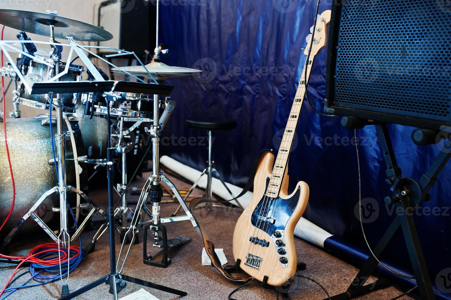 Set of musical instruments. Bass guitar and drums photo