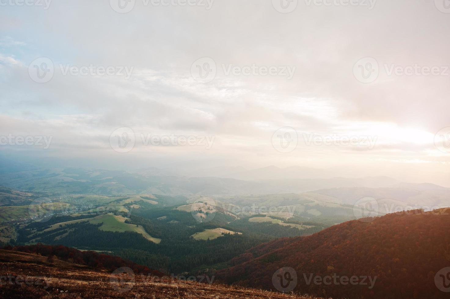 Great hills at morning with sun lights on Carpathian mountains, Ukraine, Europe photo