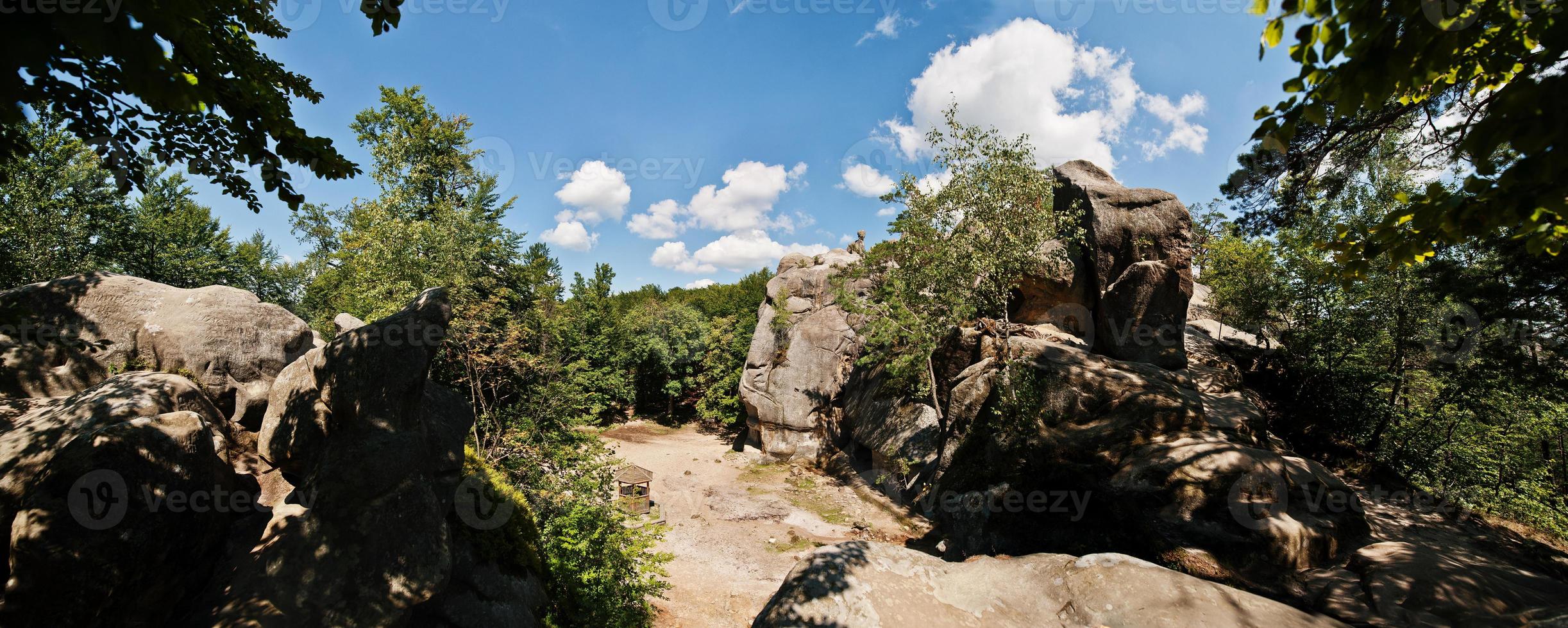 Panorama of Dovbush rocks, group of natural and man-made structures carved out of rock at western Ukraine photo