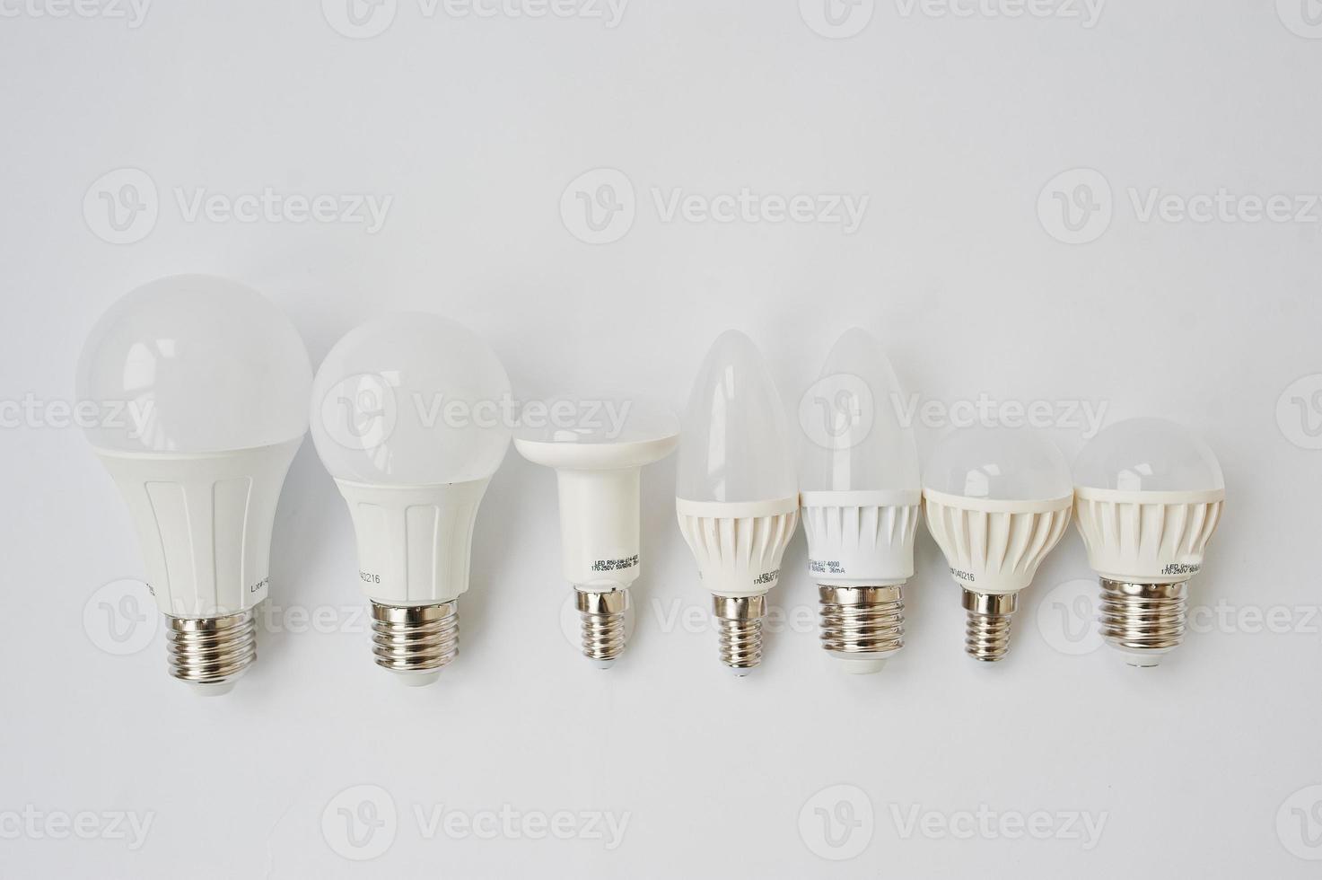 Set of row LED bulbs isolated on white background. photo