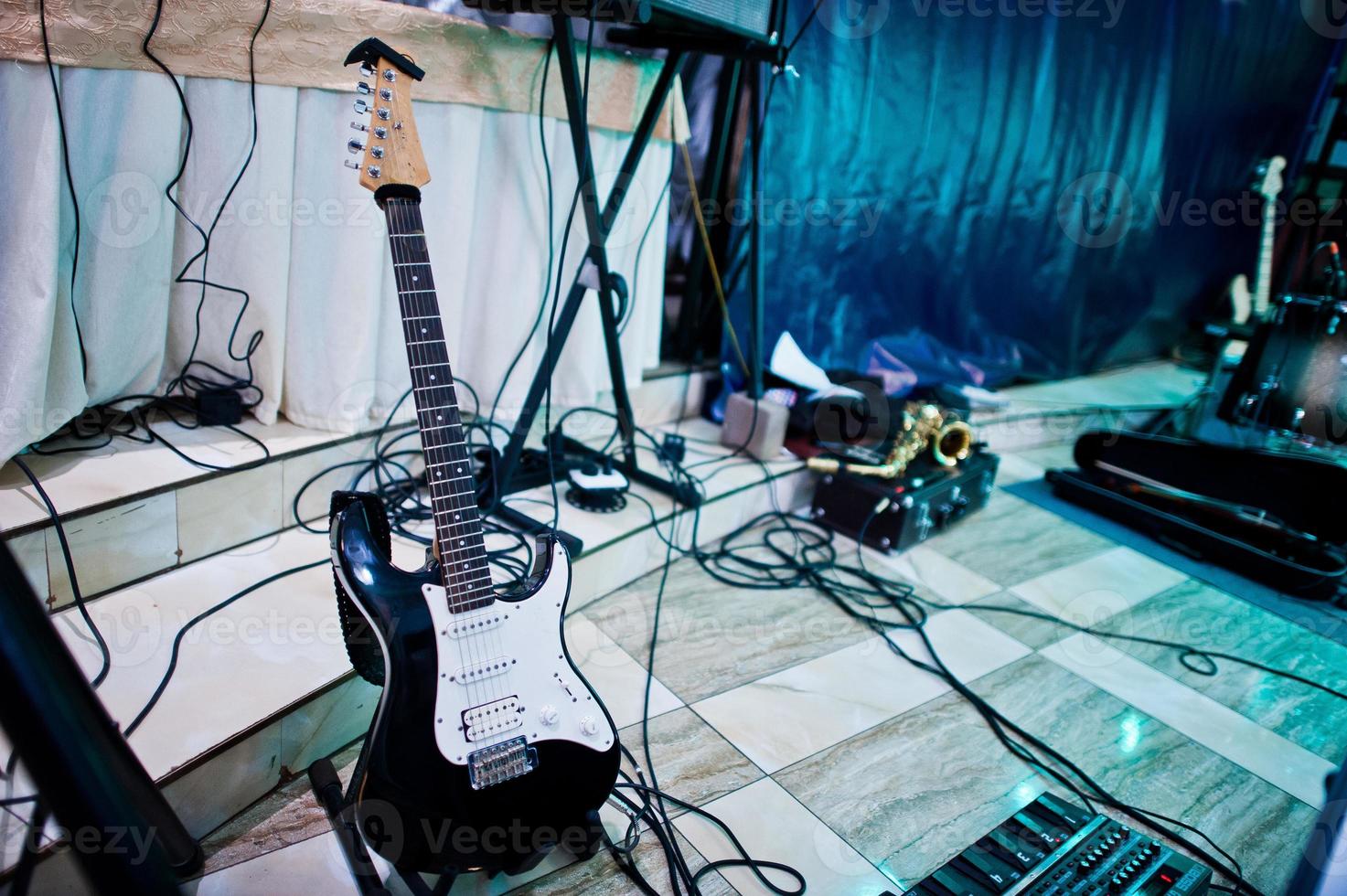 Set of musical instruments. Guitar and drums photo