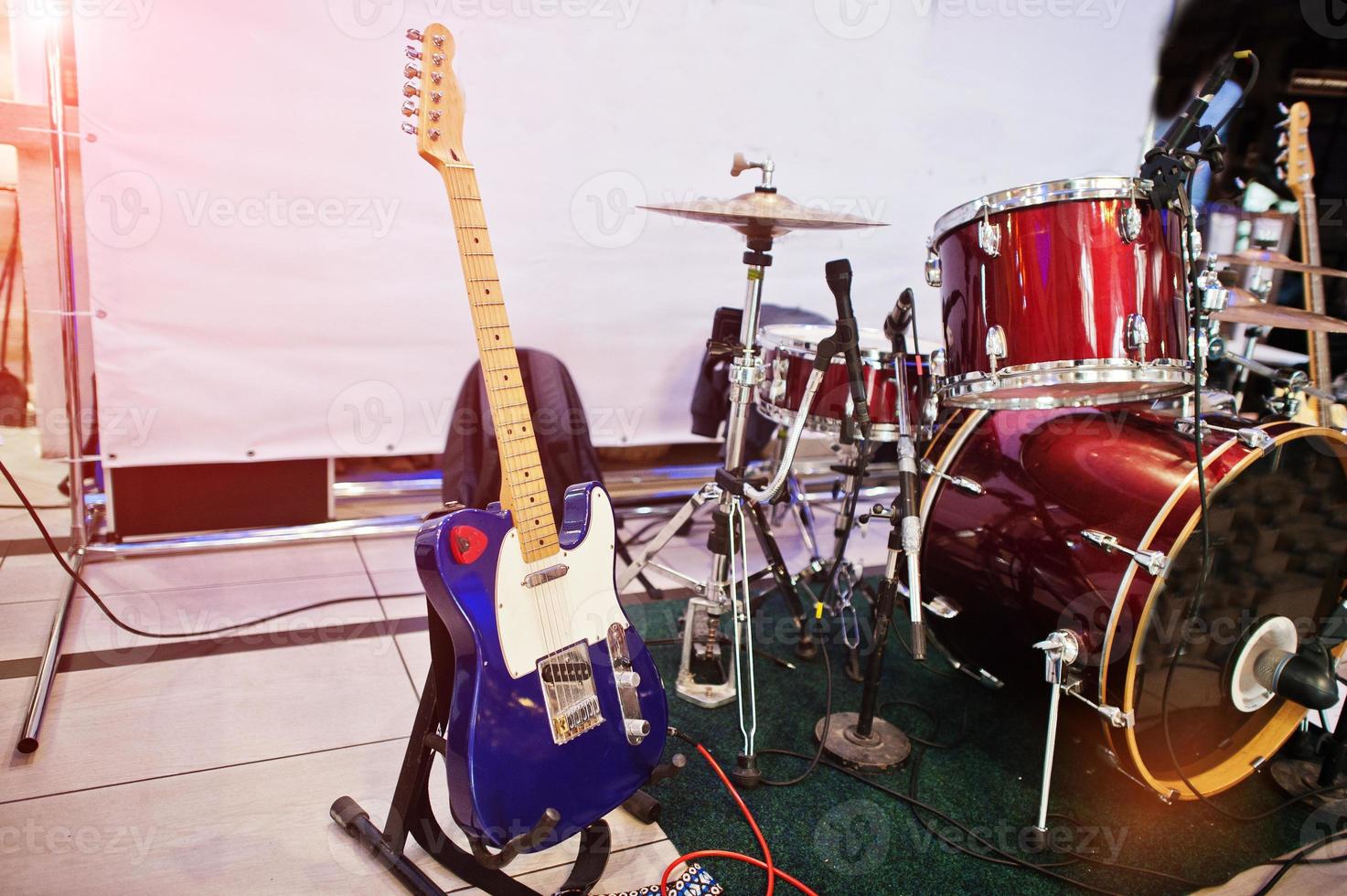 Set of musical instruments. Guitar and drums photo