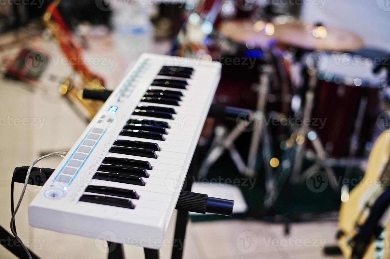 Electric piano synthesizer keyboard on stage photo