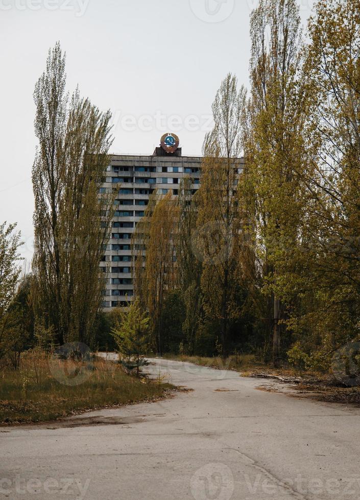 Soviet emblem at building on abadoned town Chernobyl, Ukraine. photo