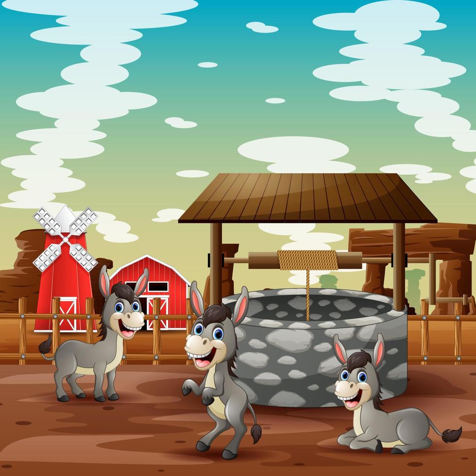 caricatura de tres burros jugando junto a un pozo en una granja vector