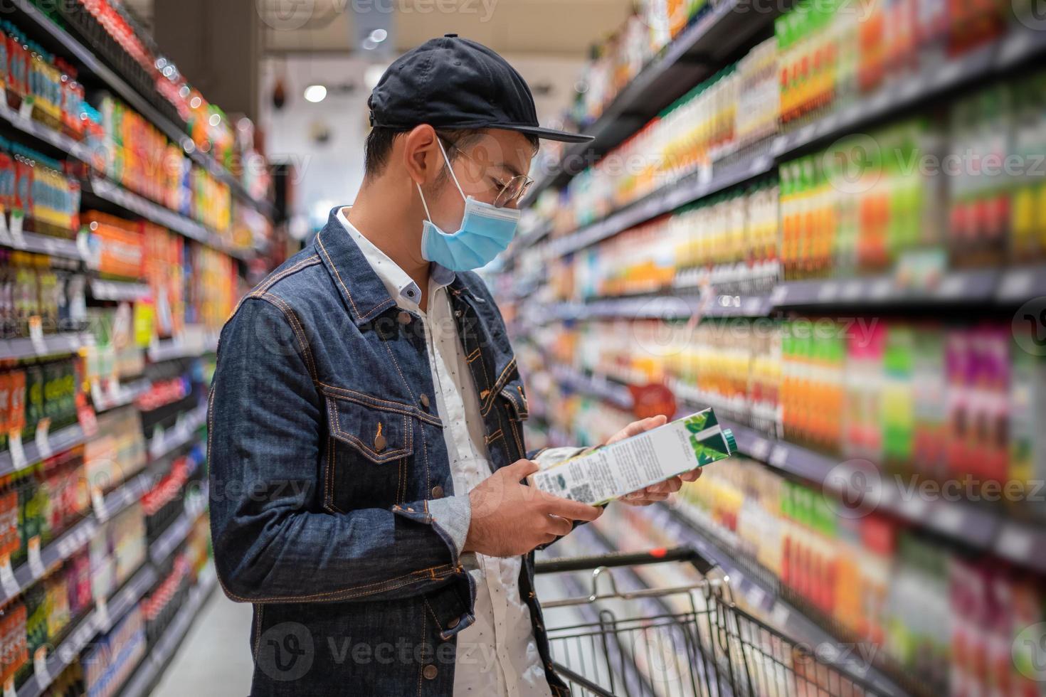 Asian men buy and shopping food  for hoarding in during the Covid outbreak photo