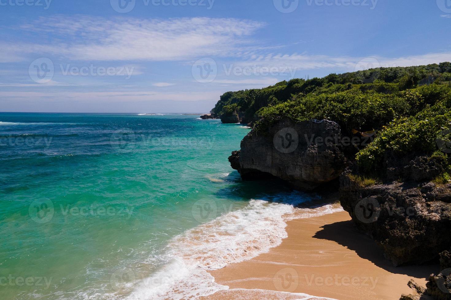 Astonishing views of ocean waves and beach, rocky shores are astonishing. photo