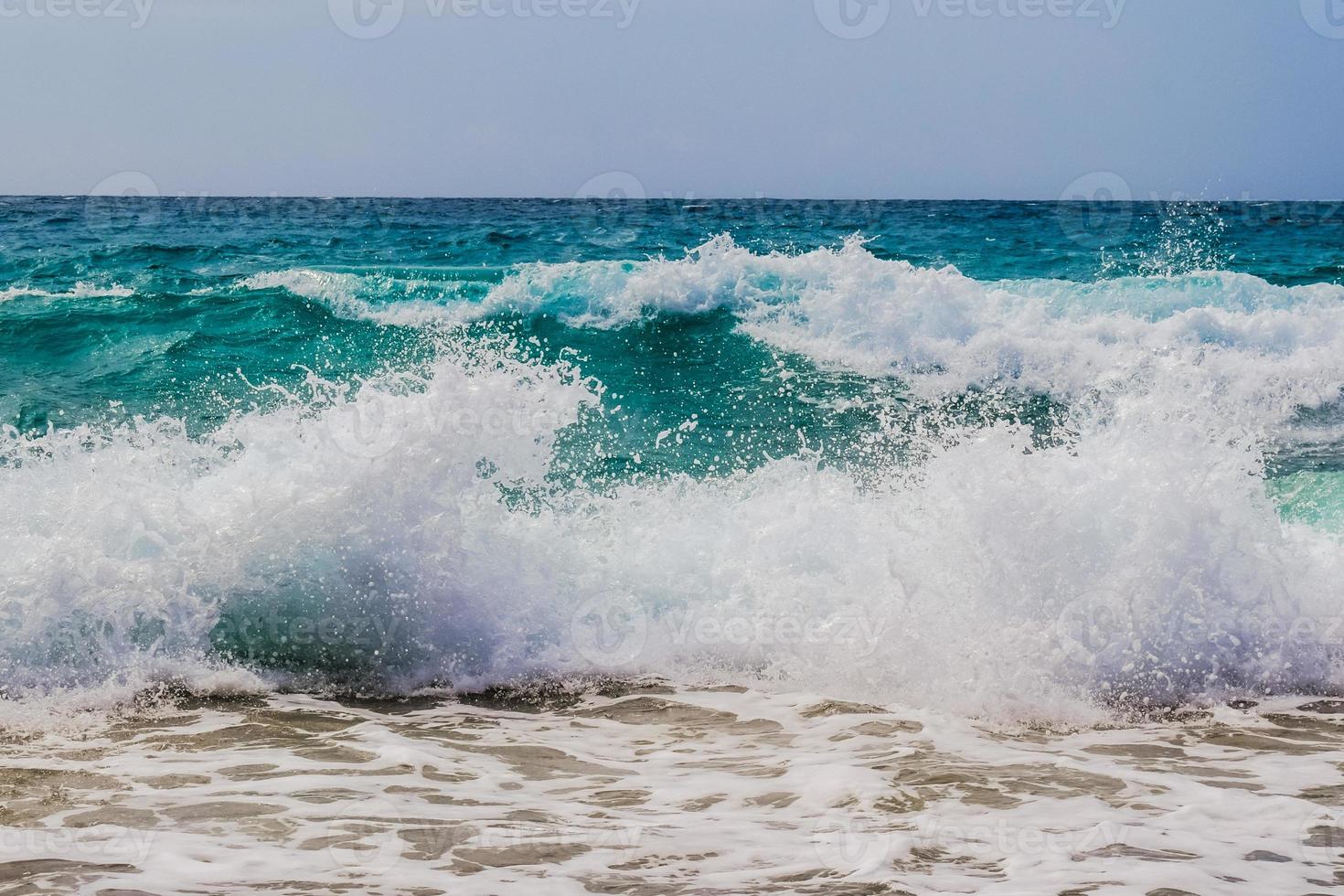 Astonishing views of ocean waves and rocky shores are astonishing. photo