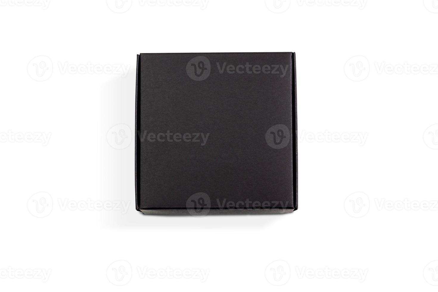 Top view of carton isolated on a white background with clipping path. Black cardboard delivery box. photo