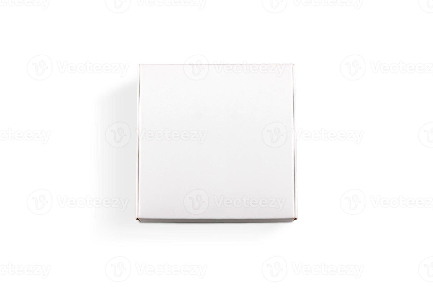 Top view of carton isolated on a white background with clipping path. White cardboard gift box for delivery. photo