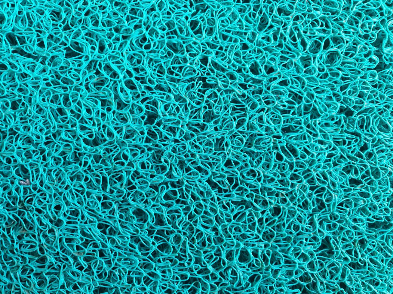 Close up blue doormat texture background photo