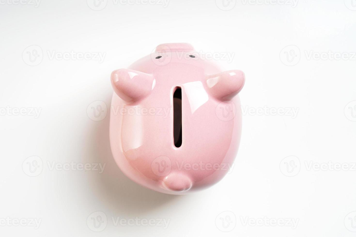 overhead view of piggy or coin bank or piggybank or money box photo