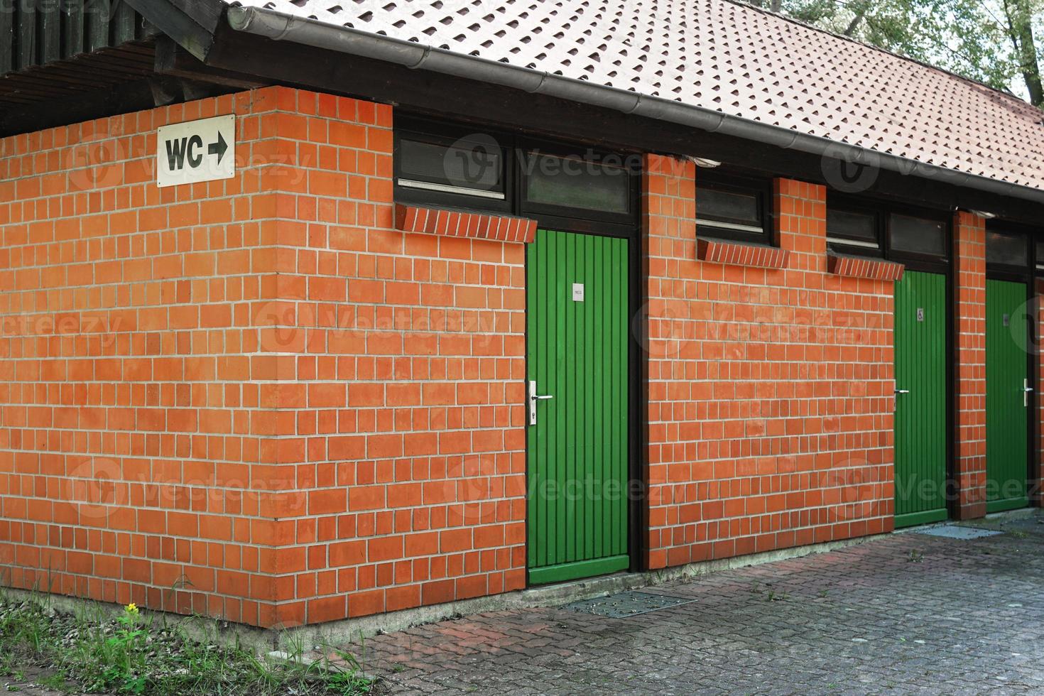 WC public toilet restroom building or outhouse photo