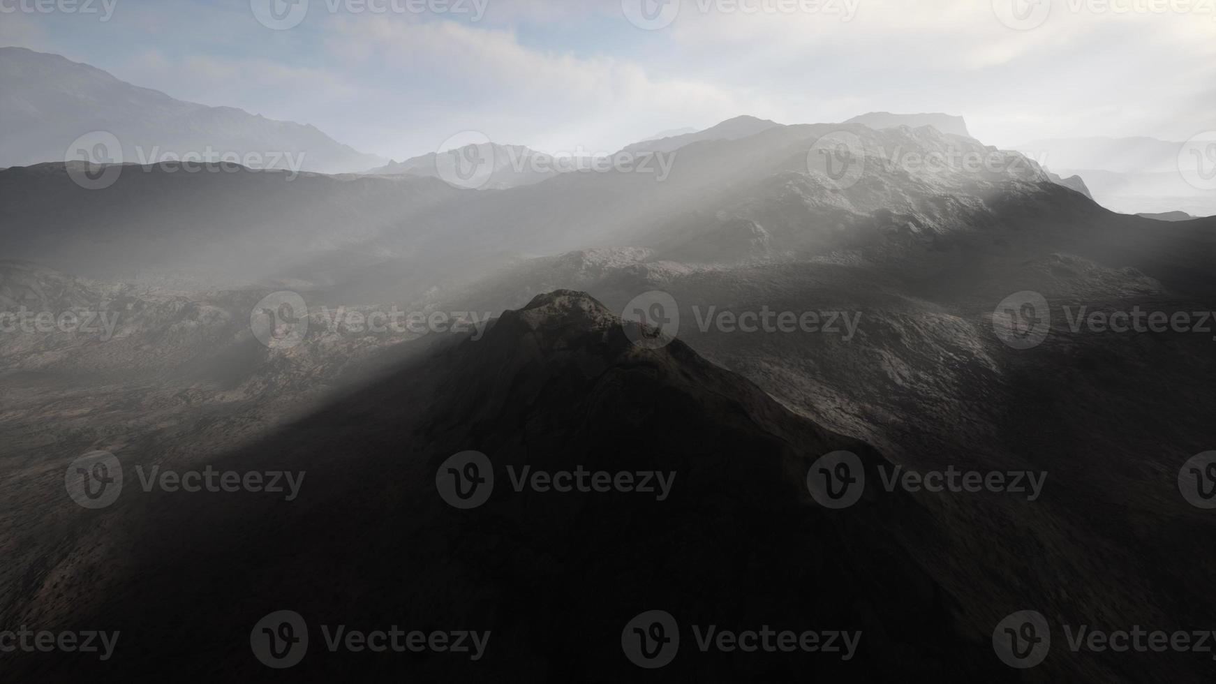 night desert landscape with rocky mountains and sunset photo