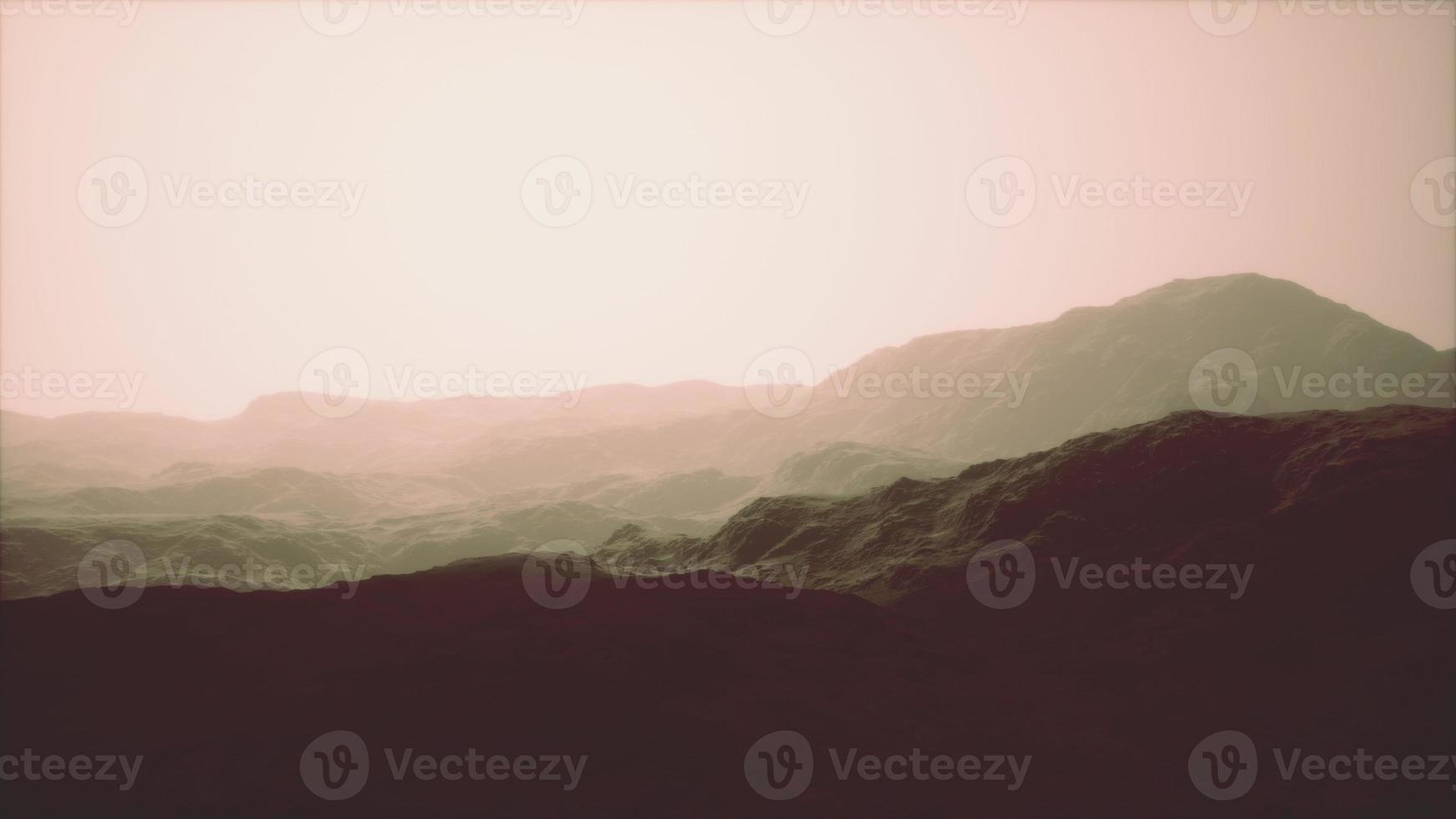 Rocks and mountains in deep fog photo