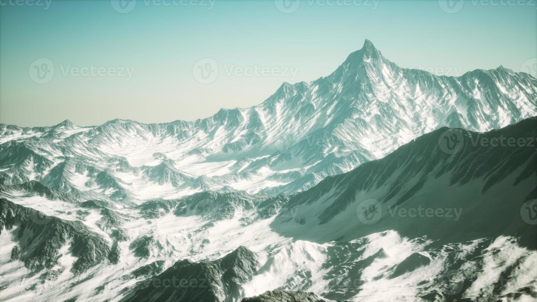 Mountain winter Caucasus landscape with white glaciers and rocky Peak photo