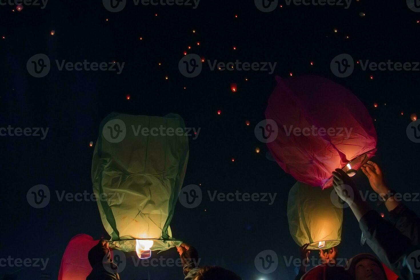 Letting go of the lanterns at night photo