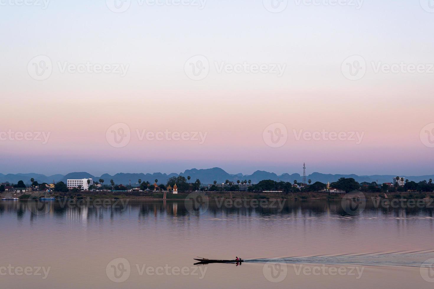 Fisherman in the countyside of Thailand and Laos with Mekong River. photo