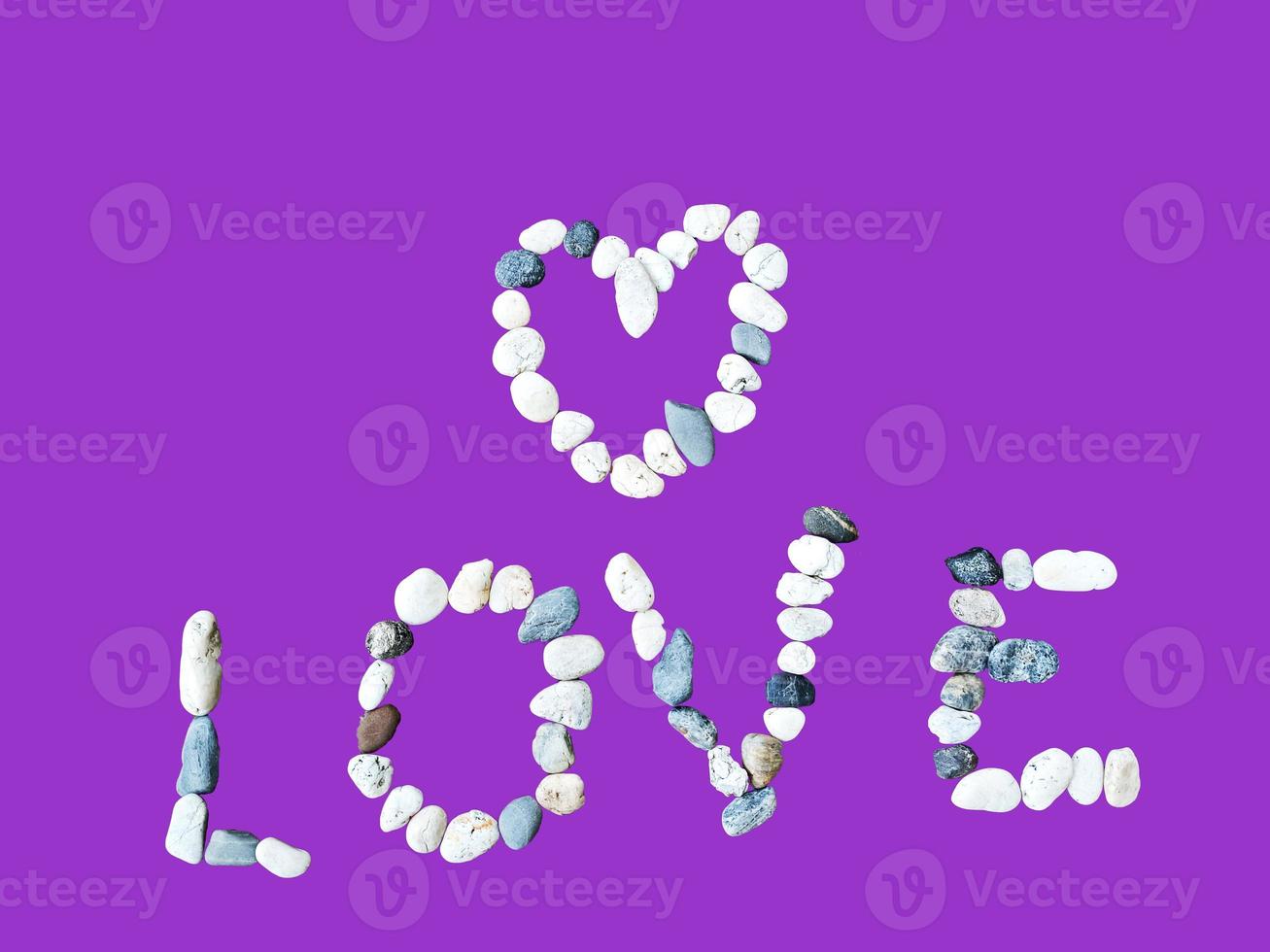 Love Heart Shaped Stone on Valentine's Day on background photo