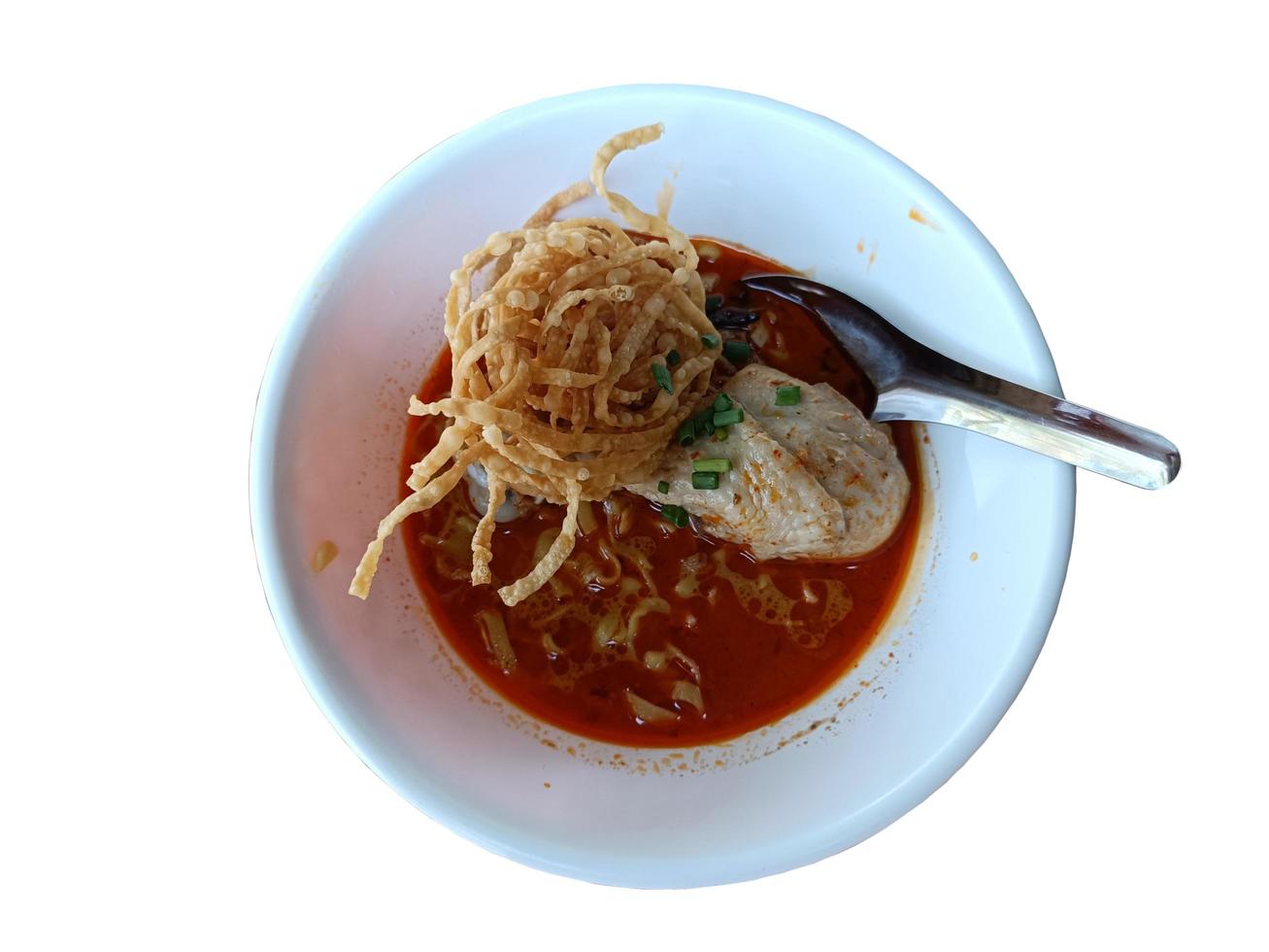 Top view isolated Khao Soi - Northern Thai Curry Noodles photo