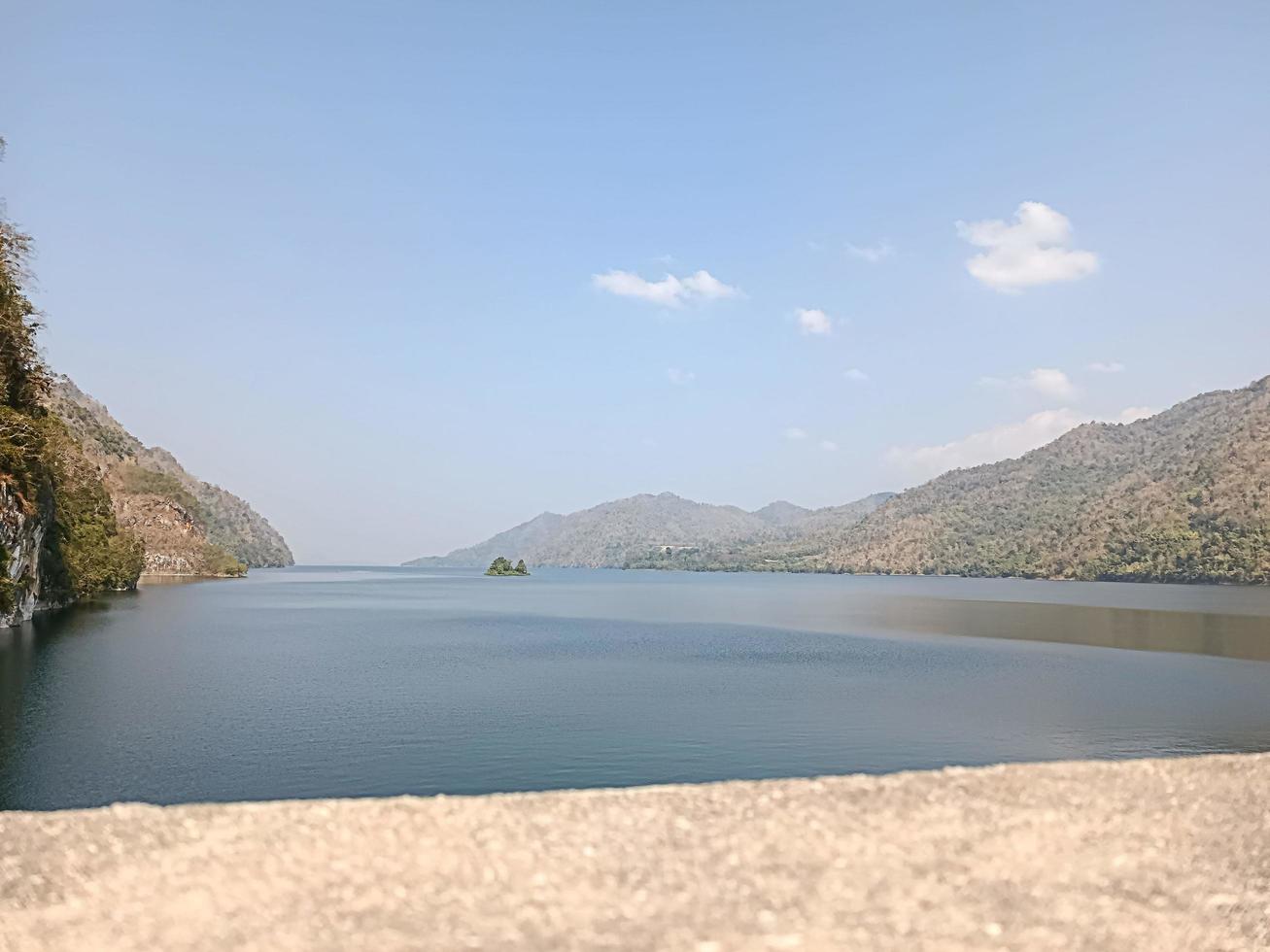 A view of the bay surrounded by mountains photo