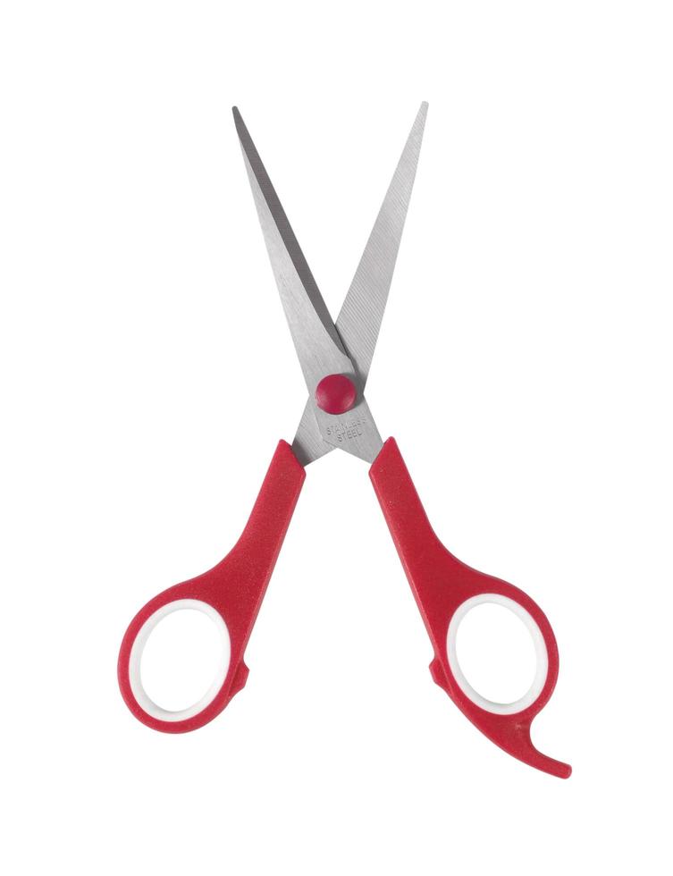 Red scissors isolated on a white background photo