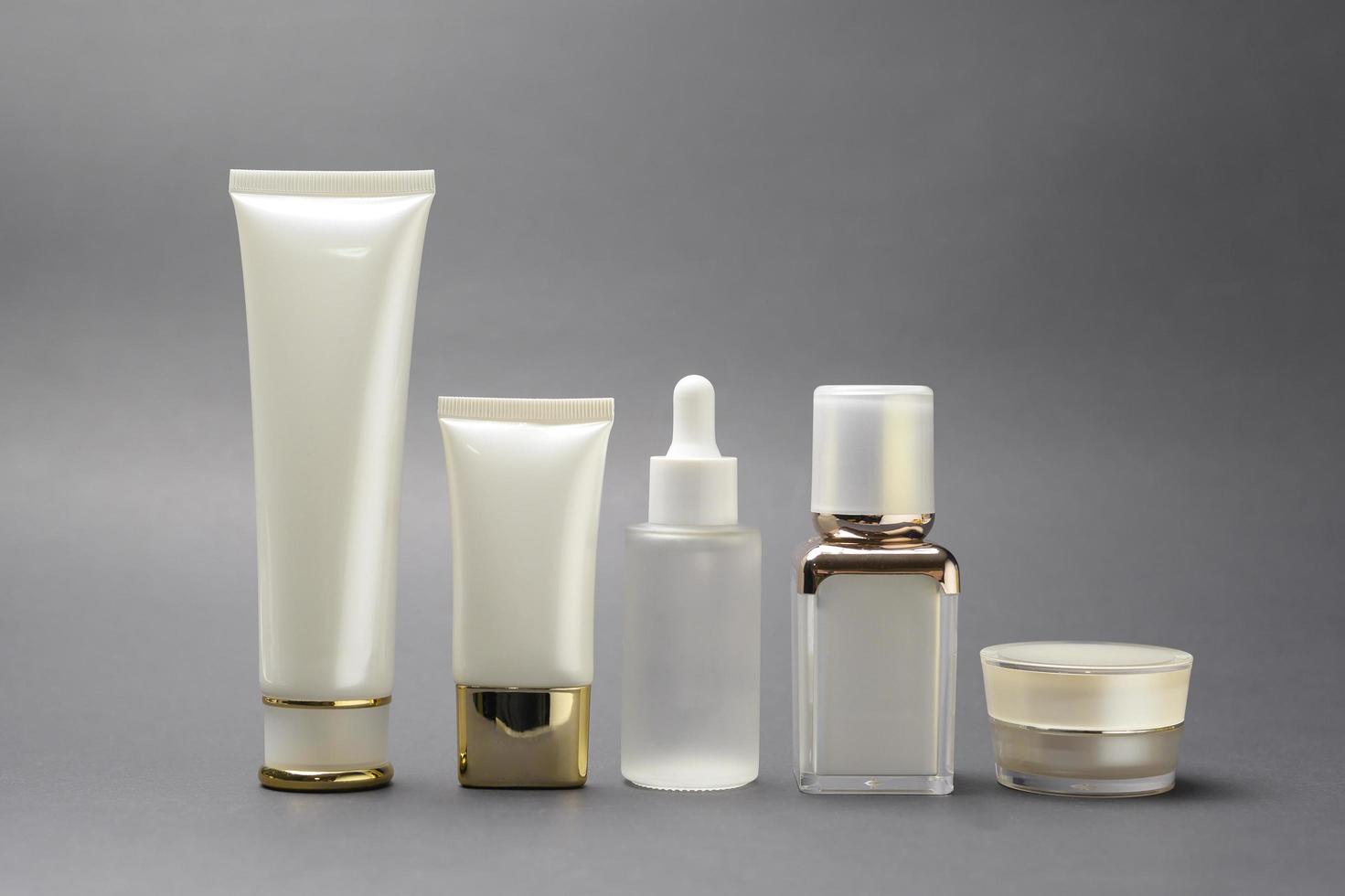 moisturizing cream bottle over black background studio, packing and skincare beauty concept photo