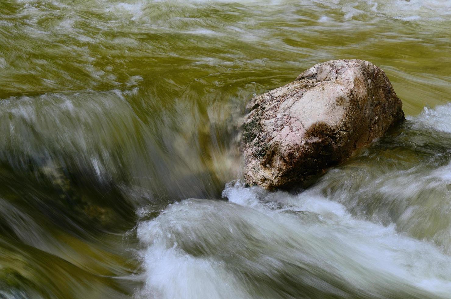 mountain stream in the mountain photo