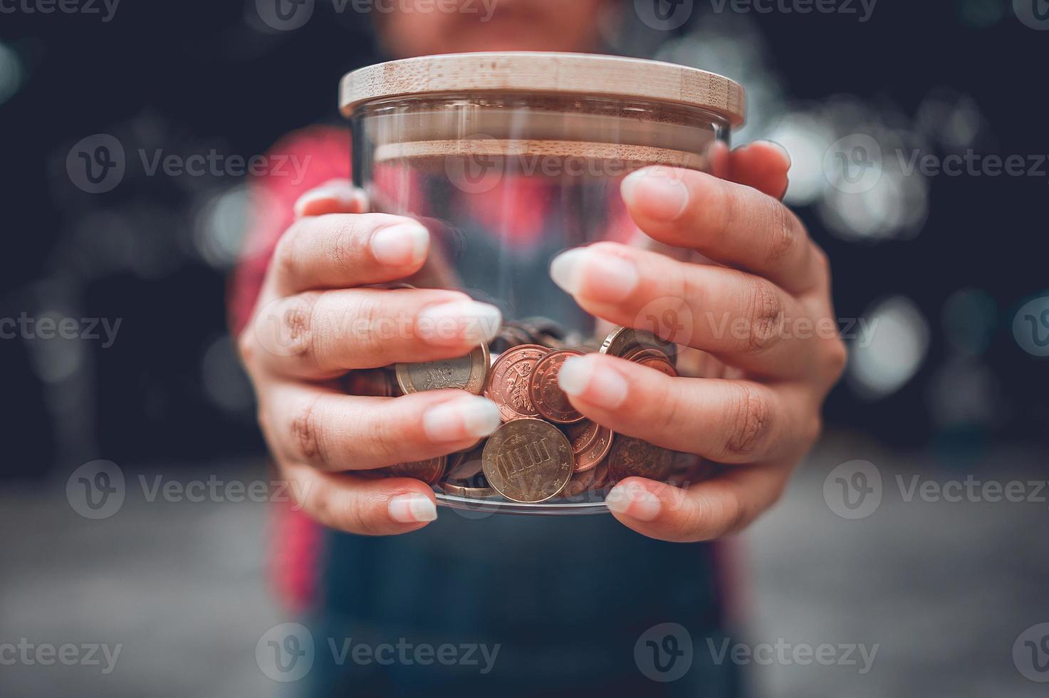 The hand that embraces the baby's money. With his two hands photo