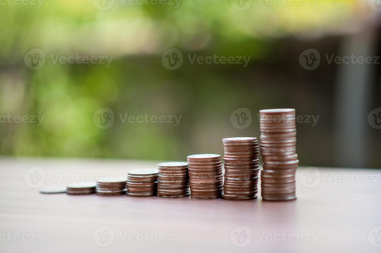 Silver coins placed together in groups. photo