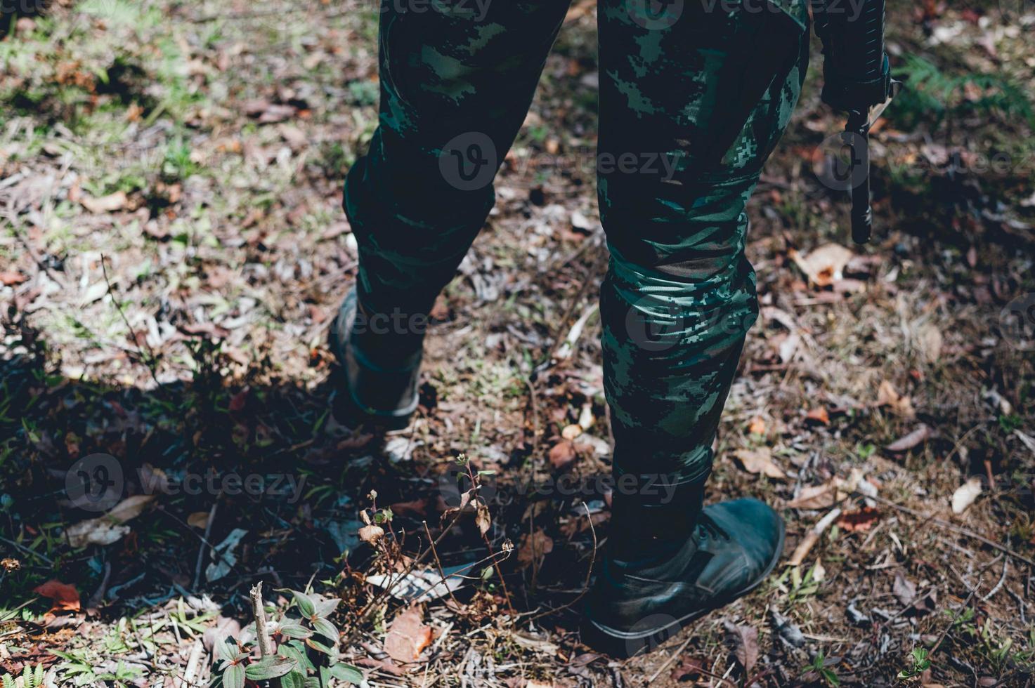 Soldiers are using the radio. And use the map For communication between military operations in the border forest. Guardian photo